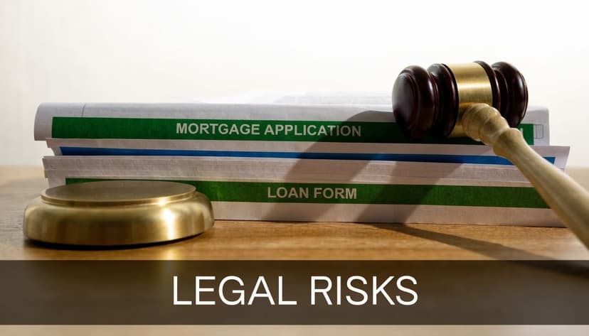 A gavel rests on a stack of mortgage application and loan form documents on a wooden table.
